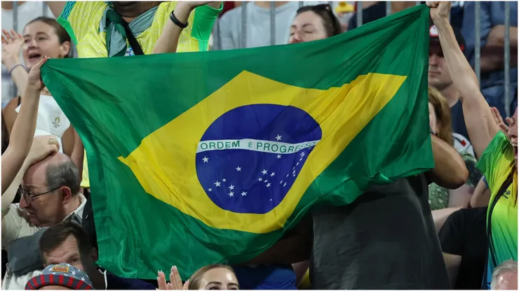 Fans wave a flag for Team Brazil