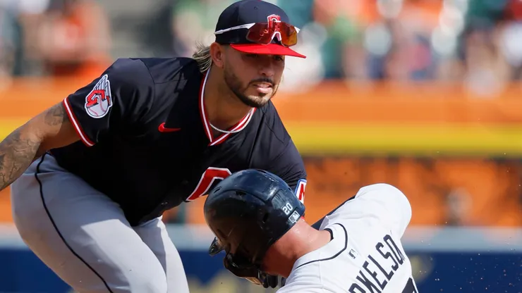 Shortstop Gabriel Arias #13 of the Cleveland Guardians tags out Spencer Torkelson #20 of the Detroit Tigers.