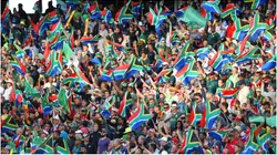 Fans waiving flags of South Africa