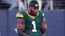 Micah Parsons #1 of the Green Bay Packers takes a knee.
