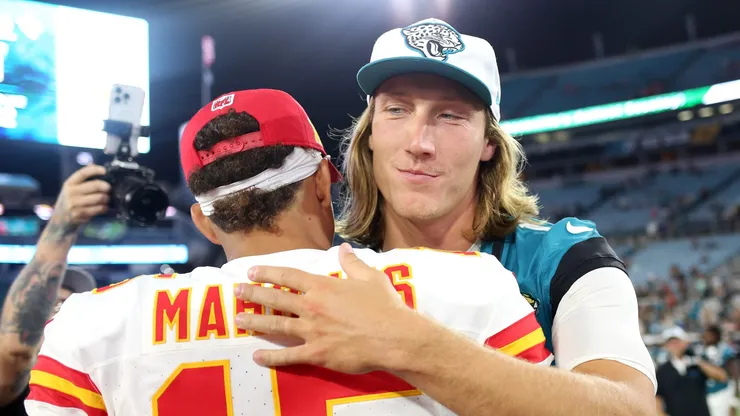 Trevor Lawrence hugs Patrick Mahomes after a preseason game on August 10, 2024, Florida.