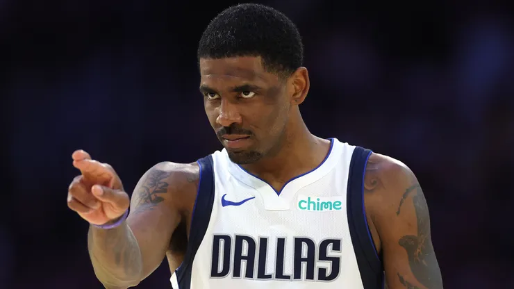 Kyrie Irving #11 of the Dallas Mavericks looks on.