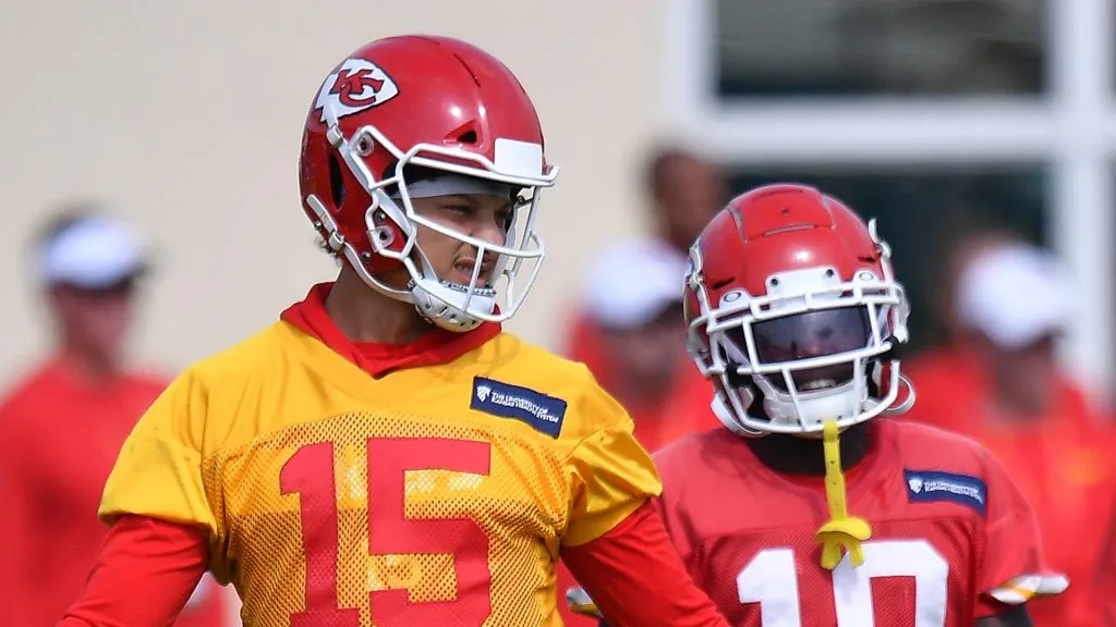 Patrick Mahomes and Tyreek Hill discuss plays during practice prior to Super Bowl LIV. (Photo by Mark Brown/Getty Images)