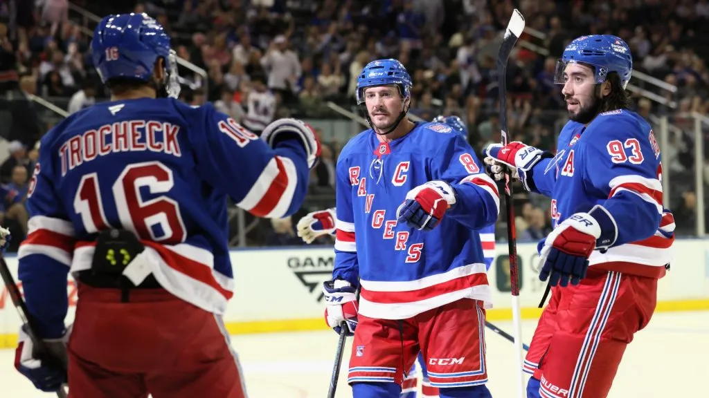 J.T. Miller #8 of the New York Rangers (c) celebrate his second period powerplay goal against the New York Islanders. (Photo by Bruce Bennett/Getty Images)