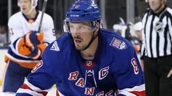 J.T. Miller #8 of the New York Rangers skates against the New York Islanders.