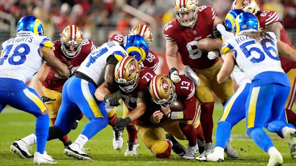 Brock Purdy of the San Francisco 49ers makes a first down against the Los Angeles Rams. (Source: Thearon W. Henderson/Getty Images)