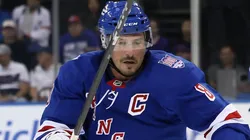 J.T. Miller #8 of the New York Rangers skates against the New York Islanders.