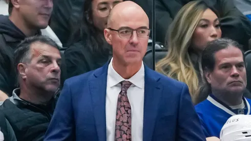 Calgary Flames head coach Ryan Huska looks on during an NHL game.