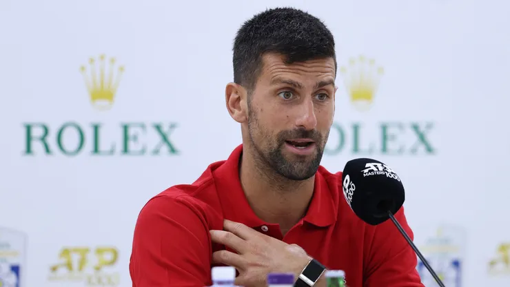 Novak Djokovic speaks during a press conference.