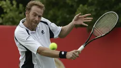 Marc Rosset plays a backhand during Queen's Club.