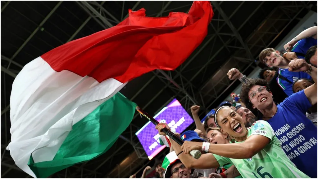 Fans waving a giant Italy flag – Charlotte Wilson/Getty Images