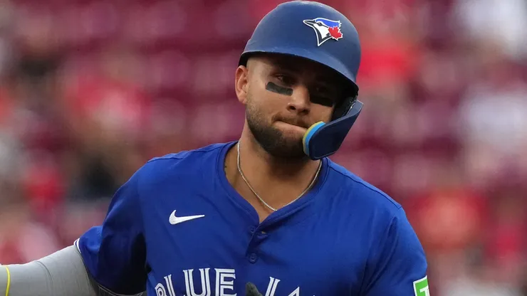 Bo Bichette #11 of the Toronto Blue Jays celebrates a three-run home run.