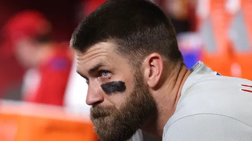 Bryce Harper looks on from the dugout on September 19, 2025 in Phoenix.