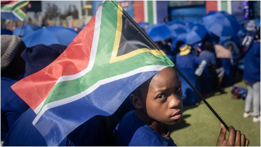 supporter holds a South African flag – Chris McGrath/Getty Images