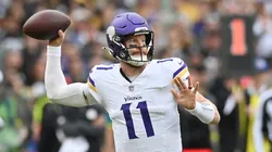Carson Wentz of Minnesota Vikings (#11) makes a pass.