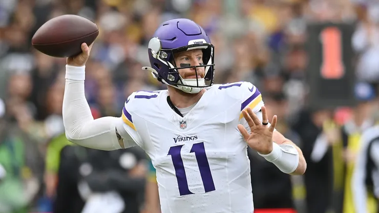 Carson Wentz of Minnesota Vikings (#11) makes a pass.