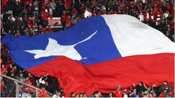 Fans display the flag of Chile