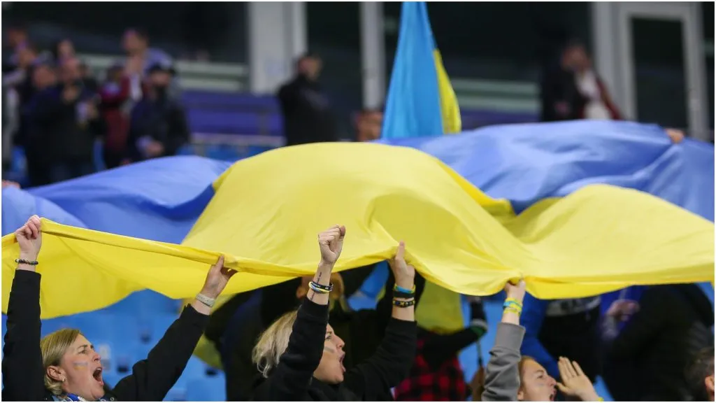 Fans with a Ukraine flag – Selim Sudheimer/Getty Images