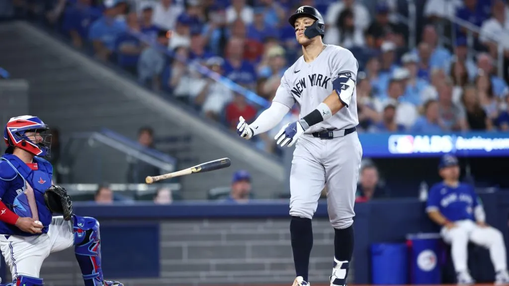 Aaron Judge #99 of the New York Yankees tosses his bat during the ninth inning in game two of the American League Division Series. (Photo by Vaughn Ridley/Getty Images)