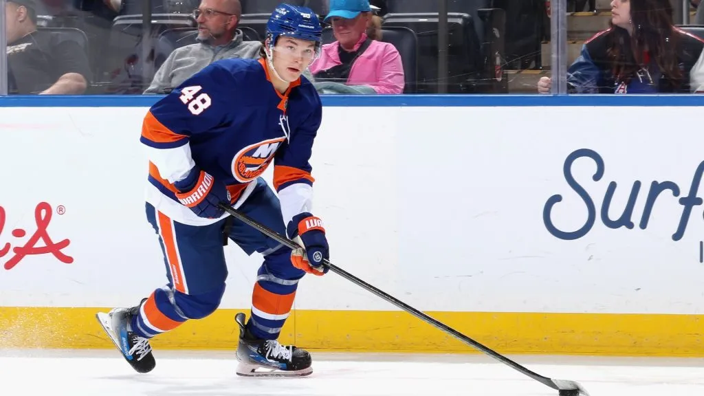 Matthew Schaefer #48 of the New York Islanders controls the puck. (Photo by Bruce Bennett/Getty Images)