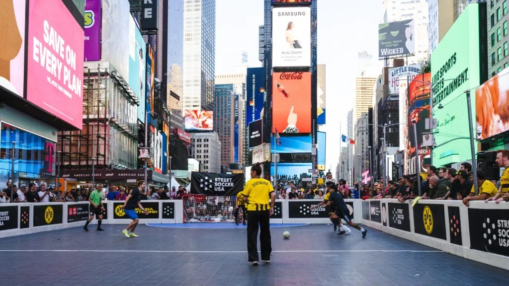 A soccer game in action at the Times Square Cup.