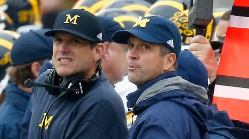 Jim and John Harbaugh during a Michigan game