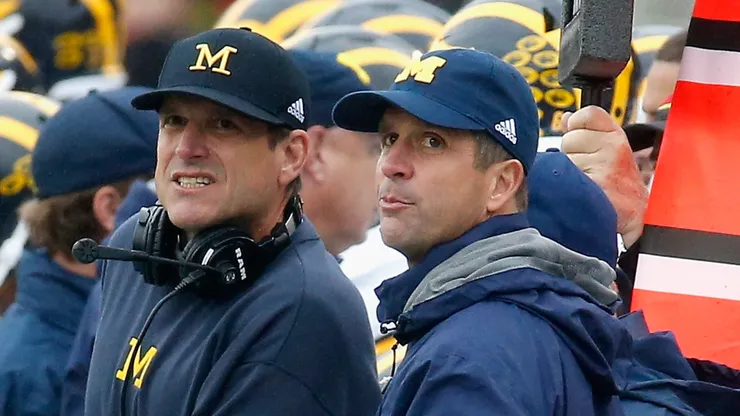 Jim and John Harbaugh during a Michigan game