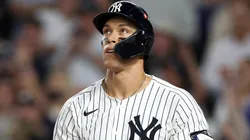 Aaron Judge #99 of the New York Yankees hits a three-run home run.