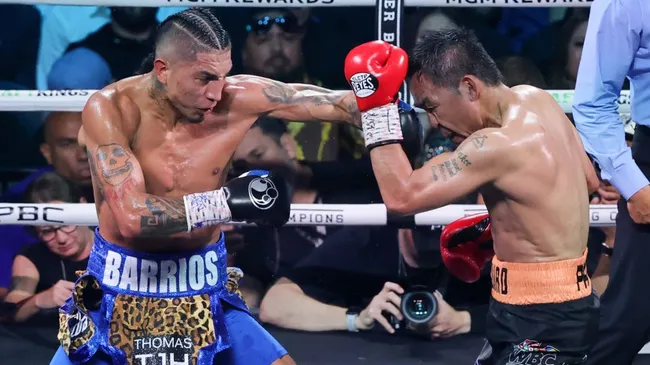 Mario Barrios throws a left at Manny Pacquiao in the seventh round of their WBC welterweight title fight (Photo by Ethan Miller/Getty Images)