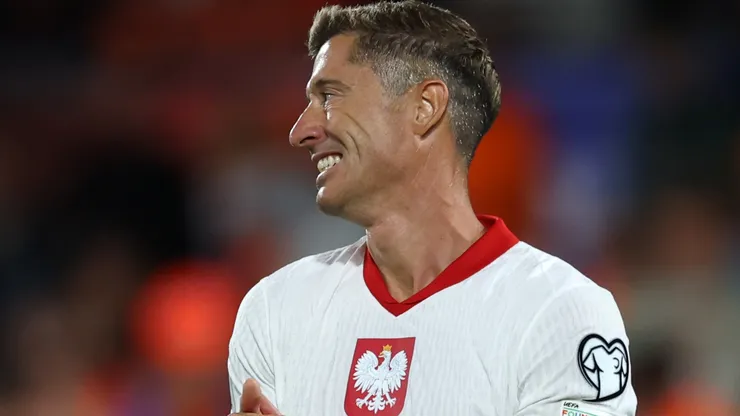 Robert Lewandowski of Poland looks on.