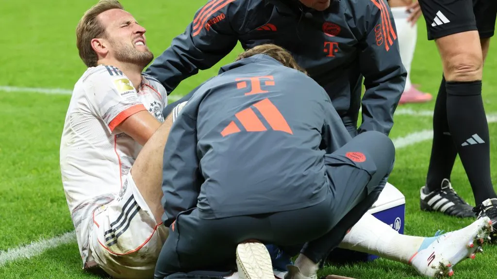 Harry Kane  reacts as he receives medical treatment against Eintracht Frankfurt. (Alexander Hassenstein/Getty Images)