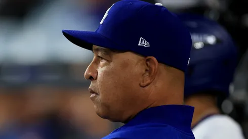 Manager Dave Roberts of the Los Angeles Dodgers looks on.
