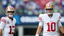 Brock Purdy and Mac Jones looks on during the third quarter vs the Seahawks on September 07, 2025 in Seattle, Washington.