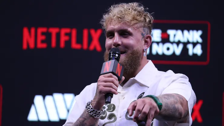 Jake Paul speaks at a news conference.