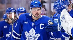 Auston Matthews #34 of the Maple Leafs celebrates a goal with teammates.