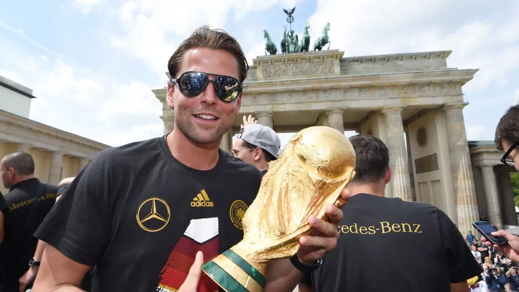 Roman Weidenfeller with the World Cup trophy during the celebrations in Germany.