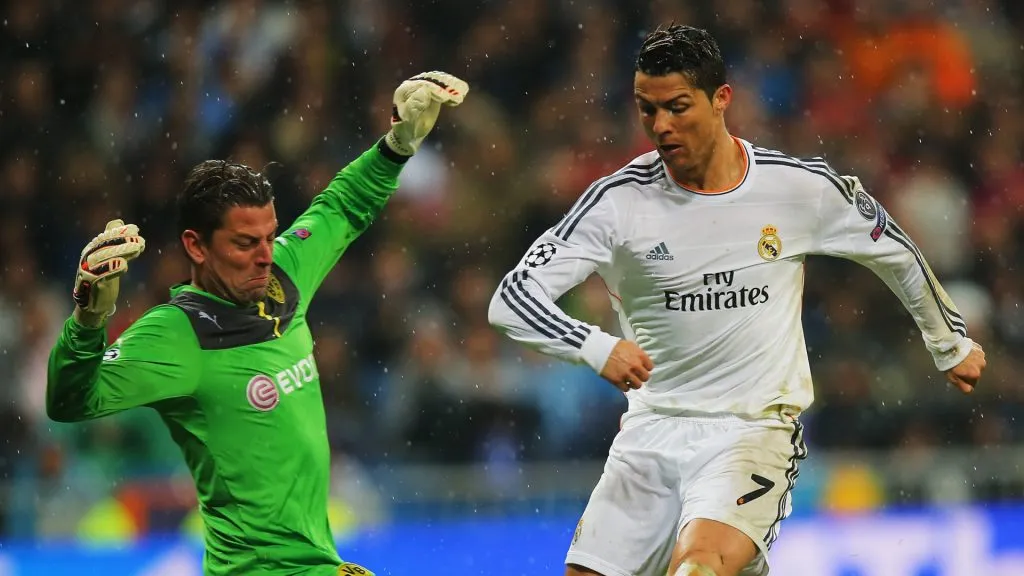 Roman Weidenfeller against Cristiano Ronaldo during a Champions League match.