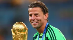 Roman Weidenfeller holds the World Cup trophy after the 2014 final.