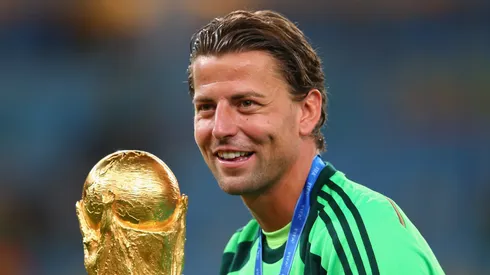 Roman Weidenfeller holds the World Cup trophy after the 2014 final.