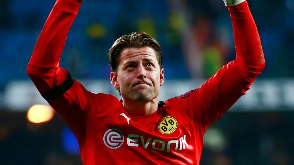 Roman Weidenfeller greets fans after a game.
