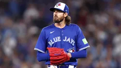 Kevin Gausman #34 of the Toronto Blue Jays walks to the dugout.