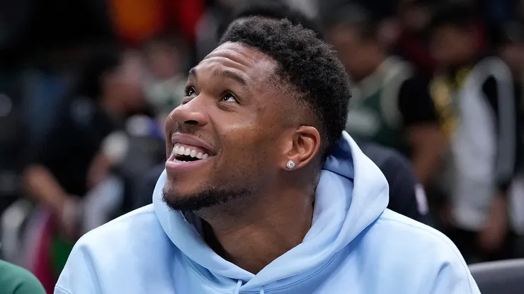 Giannis Antetokounmpo #34 of the Milwaukee Bucks smiles.
