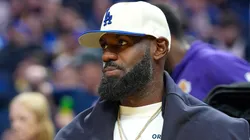 Lebron James #23 of the Los Angeles Lakers looks on from the bench.