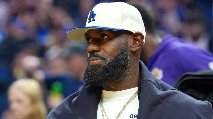 Lebron James #23 of the Los Angeles Lakers looks on from the bench.