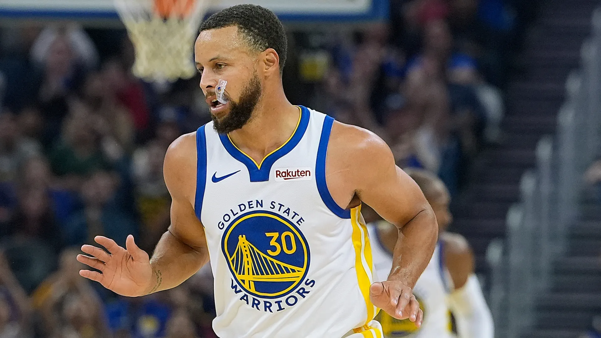 Stephen Curry looks on