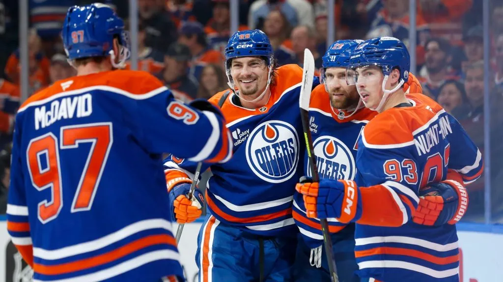Connor McDavid, David Tomasek, Leon Draisaitl and Ryan Nugent-Hopkins of the Oilers celebrate Draisaitl’s goal. (Photo by Codie McLachlan/Getty Images)