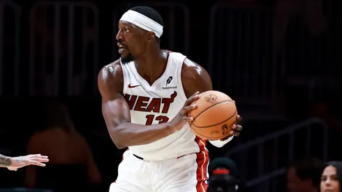 Bam Adebayo #13 of the Miami Heat controls the ball.