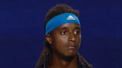 Mikael Ymer looks on during a match.