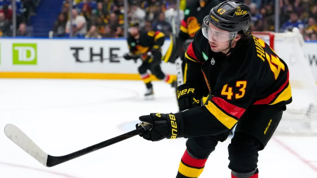 Quinn Hughes #43 of the Canucks skates during the third period of their NHL game against the Flames. Derek Cain/Getty Images