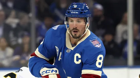 J.T. Miller #8 of the New York Rangers skates in an NHL game.